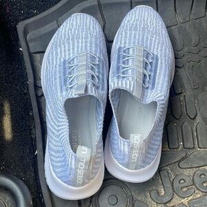 Size 41 gray white new slip in sneakers fits like ladies 9